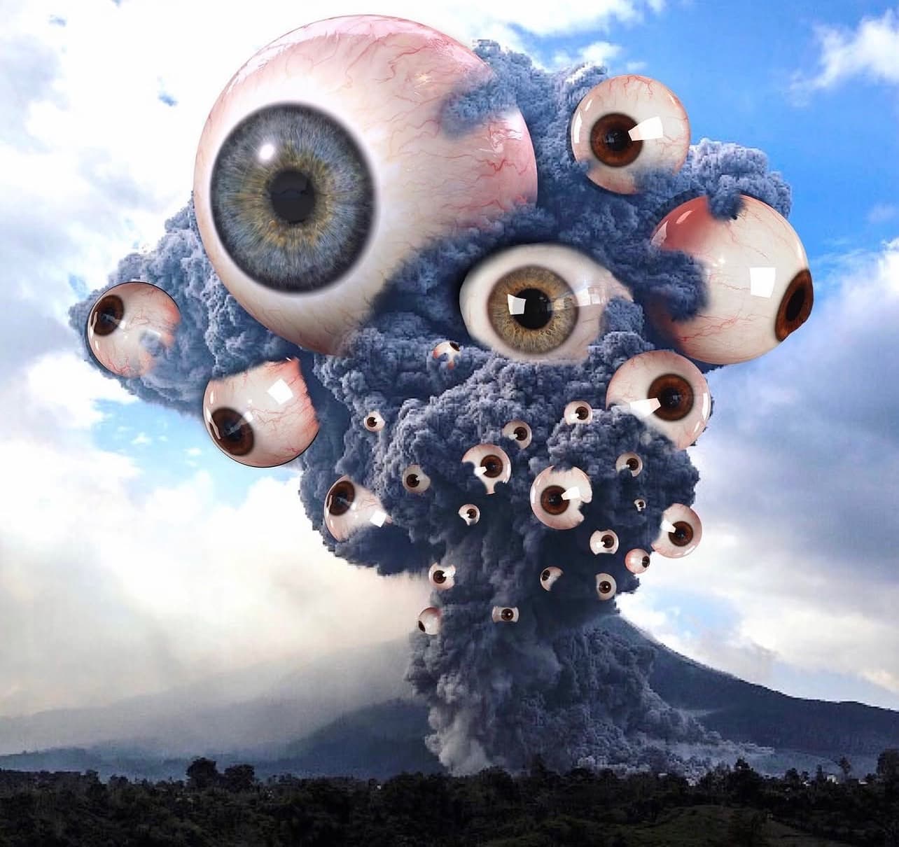 Surreal photo composite — a volcanic ash-cloud eruption covered in dozens of human eyeballs, against a blue sky