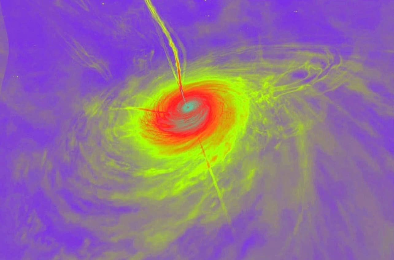 False-colour satellite image of a hurricane, rendered in a purple-to-red-to-yellow thermal heat-map palette